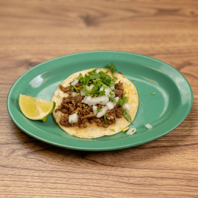 Taco w cilantro and onion.